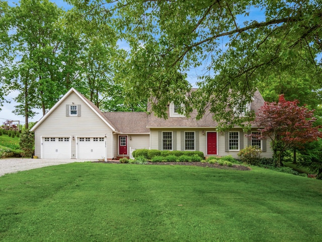 2870 Tarkman Dr, Nashport, OH 43830 - view of front of home with gravel driveway, a front lawn, an attached garage, and a shingled roof