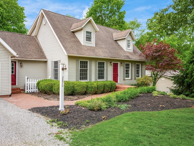 2870 Tarkman Dr, Nashport, OH 43830 - cape cod house with a front yard and a shingled roof