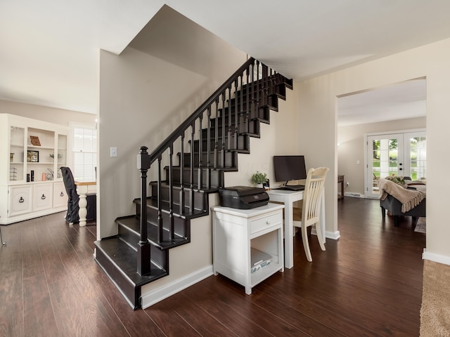 2870 Tarkman Dr, Nashport, OH 43830 - stairs featuring french doors, wood finished floors, and baseboards