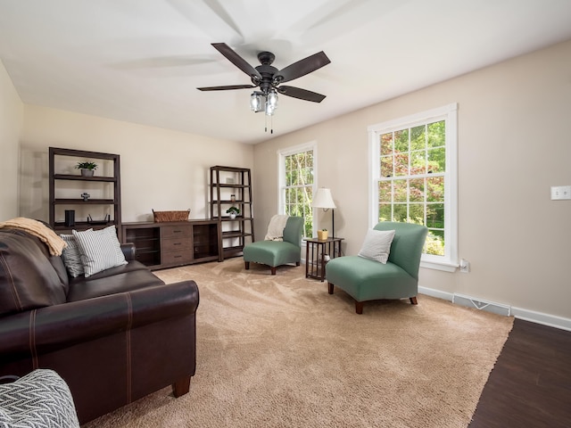 2870 Tarkman Dr, Nashport, OH 43830 - living area featuring a ceiling fan, baseboards, and wood finished floors