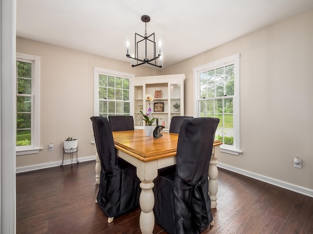 2870 Tarkman Dr, Nashport, OH 43830 - dining area with a chandelier, dark wood-style flooring, healthy amount of natural light, and baseboards