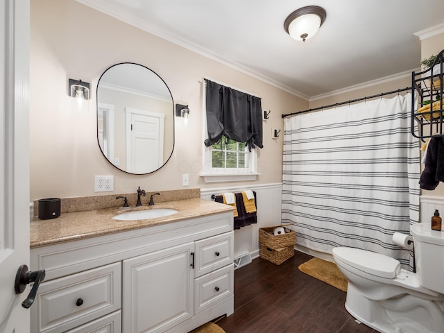2870 Tarkman Dr, Nashport, OH 43830 - bathroom featuring toilet, crown molding, vanity, wood finished floors, and a wainscoted wall