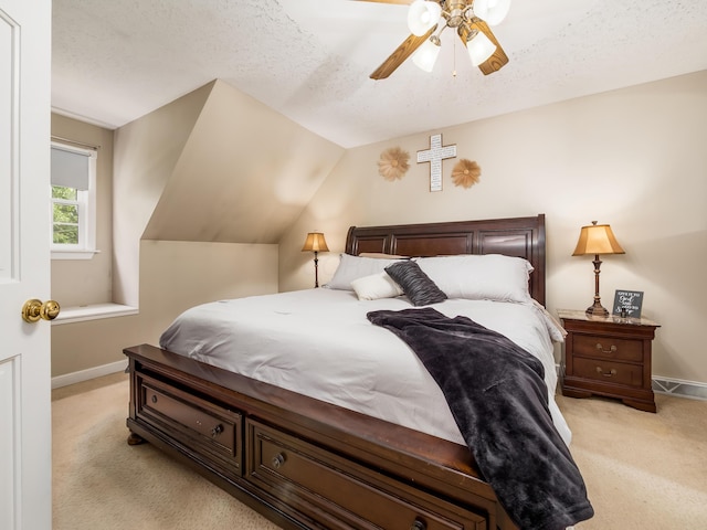 2870 Tarkman Dr, Nashport, OH 43830 - bedroom with light colored carpet, baseboards, a ceiling fan, a textured ceiling, and lofted ceiling