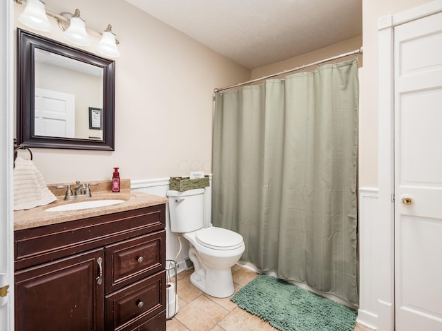 2870 Tarkman Dr, Nashport, OH 43830 - bathroom featuring tile patterned flooring, vanity, toilet, and a shower with curtain