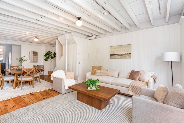 503 City Park Ave, Columbus, OH 43215 - living room with hardwood / wood-style floors, arched walkways, and beam ceiling