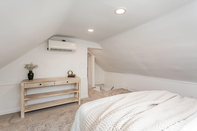 503 City Park Ave, Columbus, OH 43215 - carpeted bedroom featuring a wall unit AC, vaulted ceiling, and recessed lighting