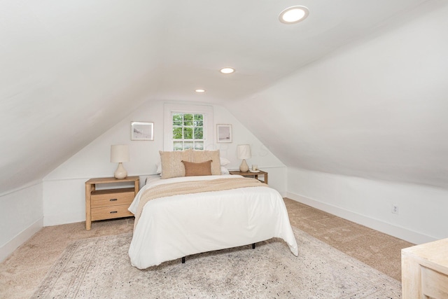 503 City Park Ave, Columbus, OH 43215 - carpeted bedroom featuring lofted ceiling, baseboards, and recessed lighting