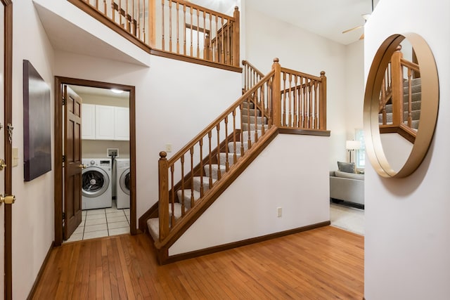 5839 Castleknock Rd, Dublin, OH 43016 - stairway with separate washer and dryer, wood-type flooring, baseboards, and a ceiling fan
