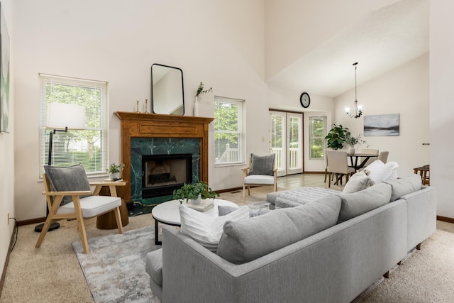 5839 Castleknock Rd, Dublin, OH 43016 - living room featuring high vaulted ceiling, light carpet, a fireplace, baseboards, and healthy amount of natural light