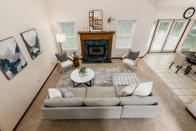 5839 Castleknock Rd, Dublin, OH 43016 - living room featuring a premium fireplace, tile patterned flooring, and baseboards