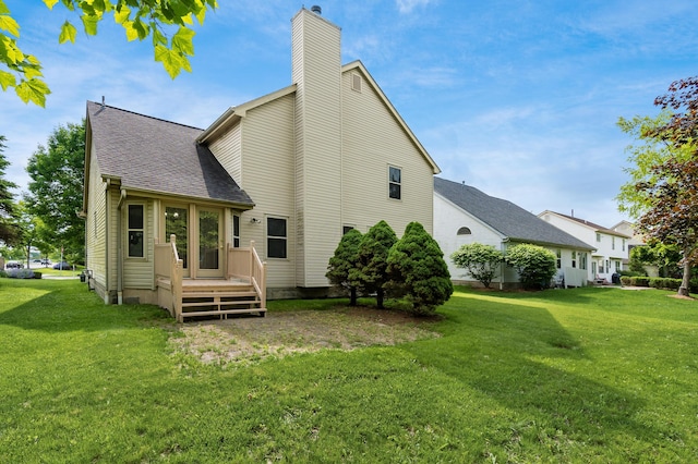 5839 Castleknock Rd, Dublin, OH 43016 - rear view of property featuring a chimney, a yard, a deck, and a shingled roof