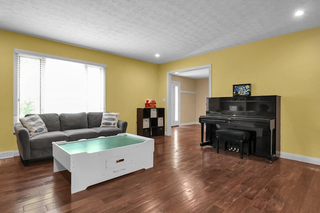 4558 Crompton Dr, Columbus, OH 43220 - living room with baseboards, dark wood-type flooring, and recessed lighting