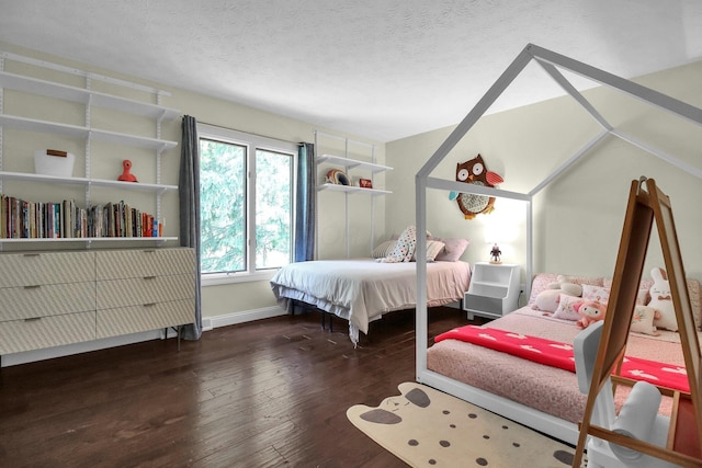 4558 Crompton Dr, Columbus, OH 43220 - bedroom featuring hardwood / wood-style flooring, a textured ceiling, baseboards, and lofted ceiling
