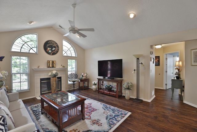 880 Village Brook Way, Columbus, OH 43235 - living room with ceiling fan, plenty of natural light, wood finished floors, a tiled fireplace, and high vaulted ceiling