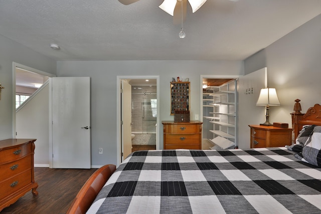 880 Village Brook Way, Columbus, OH 43235 - bedroom featuring dark wood-style flooring, ensuite bathroom, a ceiling fan, and baseboards