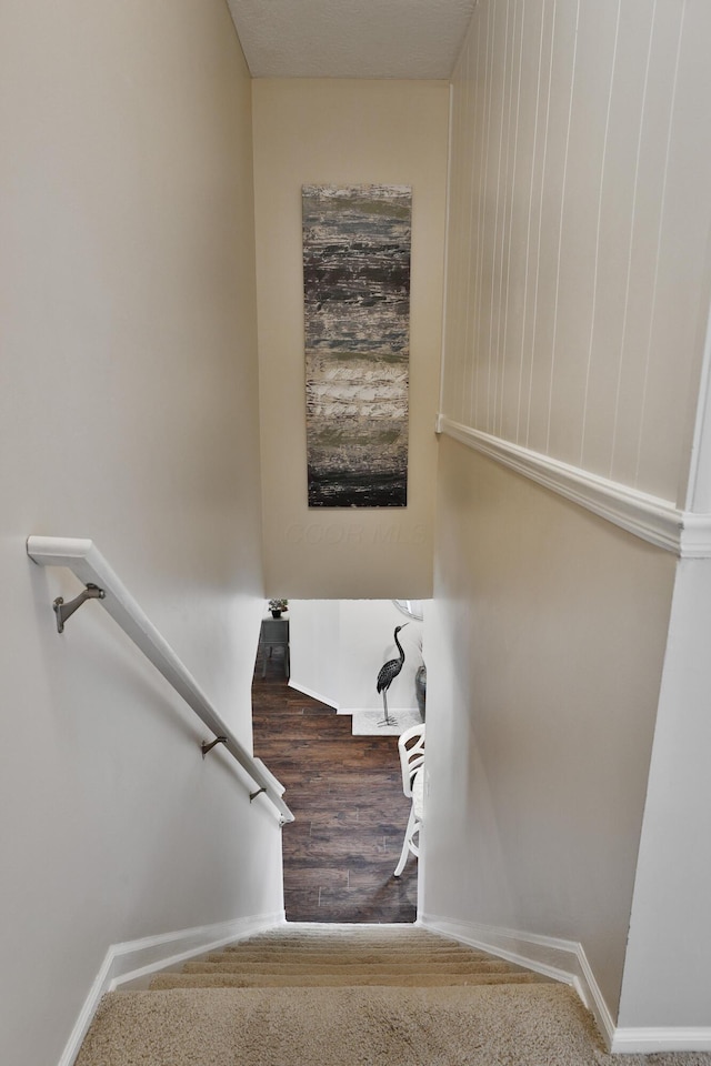880 Village Brook Way, Columbus, OH 43235 - staircase with baseboards and wood finished floors