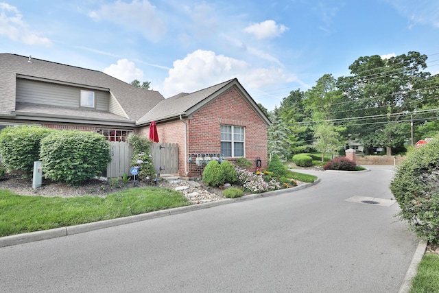 880 Village Brook Way, Columbus, OH 43235 - view of front of house featuring brick siding and roof with shingles