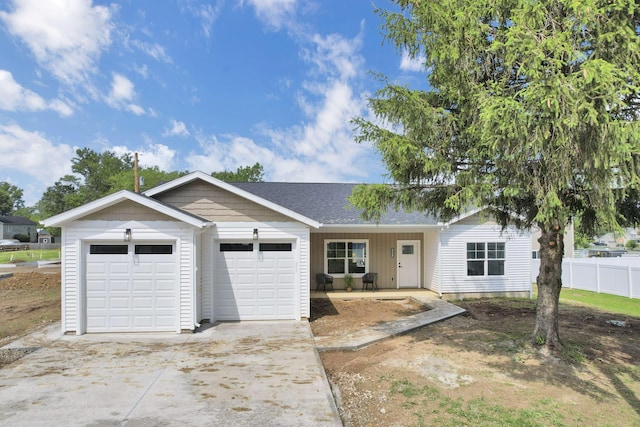13081 Dogwood Rd NE, Thornville, OH 43076 - ranch-style home with a garage, driveway, covered porch, and a shingled roof