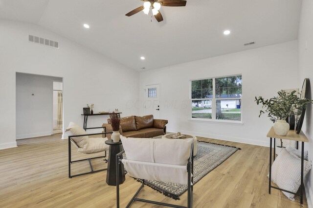 13081 Dogwood Rd NE, Thornville, OH 43076 - living area with vaulted ceiling, a ceiling fan, light wood-style flooring, baseboards, and recessed lighting