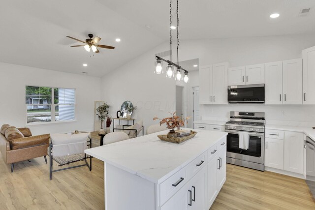 13081 Dogwood Rd NE, Thornville, OH 43076 - kitchen featuring stainless steel appliances, a ceiling fan, a kitchen island, white cabinetry, and recessed lighting
