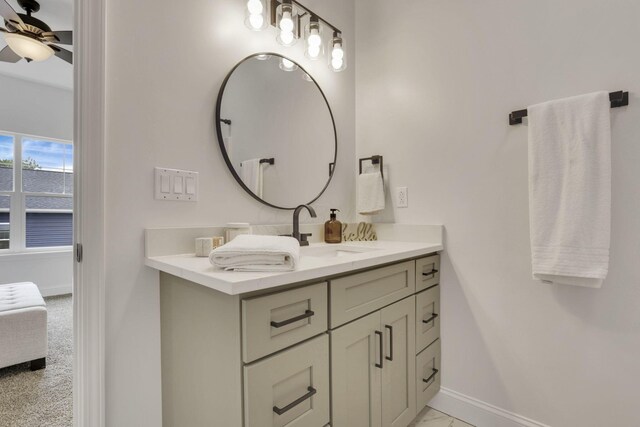 13081 Dogwood Rd NE, Thornville, OH 43076 - ensuite bathroom featuring baseboards, vanity, and a ceiling fan