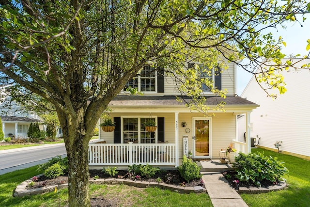 7765 Lantana Ave Unit 164, Blacklick, OH 43004 - view of front of property featuring a porch and a front yard