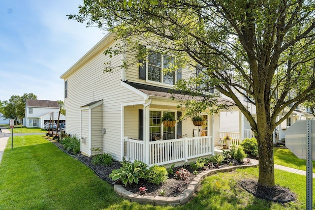 7765 Lantana Ave Unit 164, Blacklick, OH 43004 - view of front of property with covered porch and a front lawn