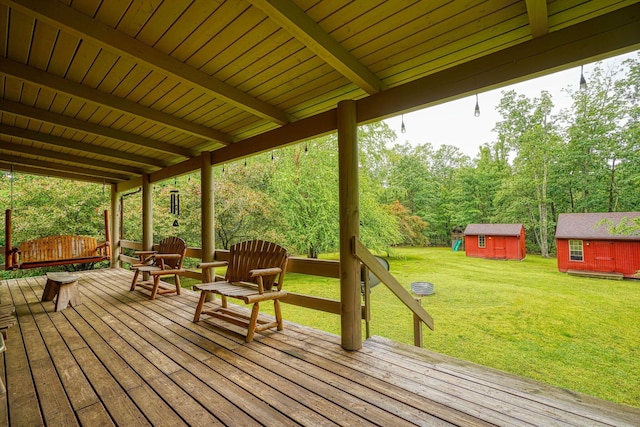 7 Whiskey Run Rd, Chillicothe, OH 45601 - wooden terrace with an outdoor structure, a yard, and a wooded view