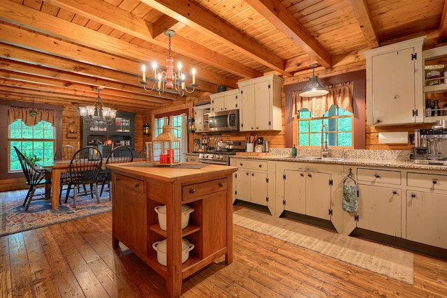 7 Whiskey Run Rd, Chillicothe, OH 45601 - kitchen with a chandelier, wood counters, open shelves, stainless steel appliances, and a sink