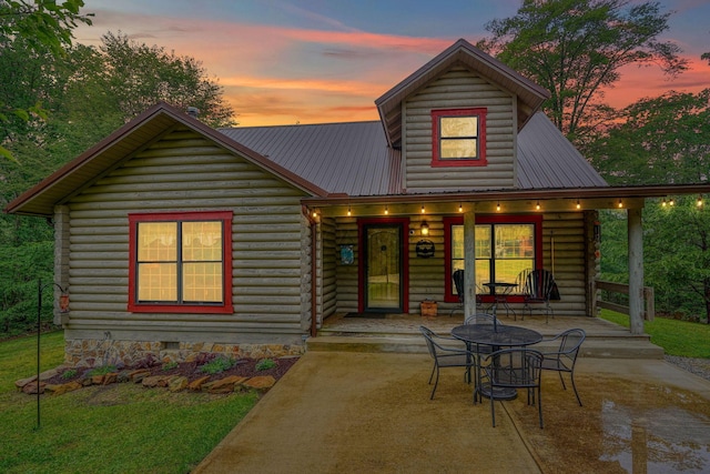 7 Whiskey Run Rd, Chillicothe, OH 45601 - view of front of house featuring log siding, covered porch, and metal roof