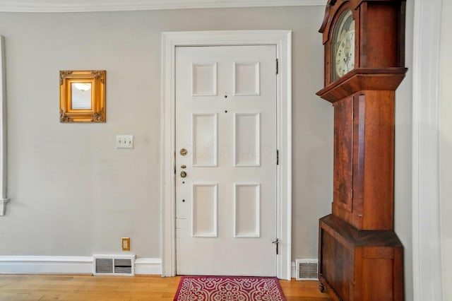 1875 King Ave, Columbus, OH 43212 - entryway with wood finished floors, ornamental molding, and baseboards