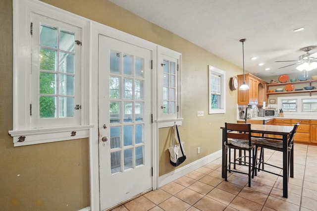 1875 King Ave, Columbus, OH 43212 - dining room featuring light tile patterned flooring, ceiling fan, baseboards, and recessed lighting