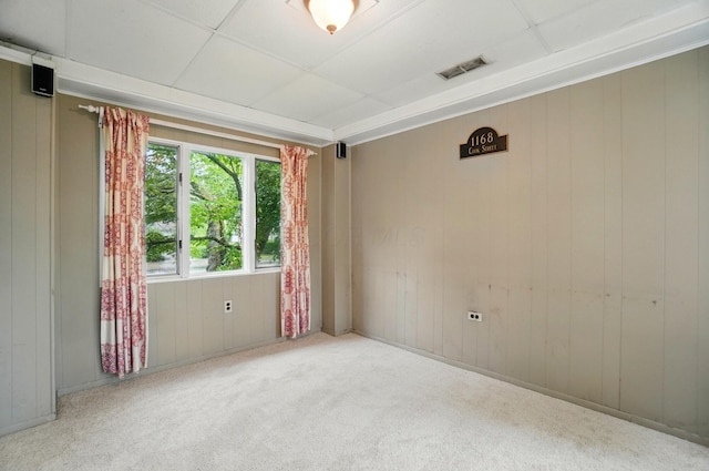 1875 King Ave, Columbus, OH 43212 - empty room featuring carpet and wooden walls