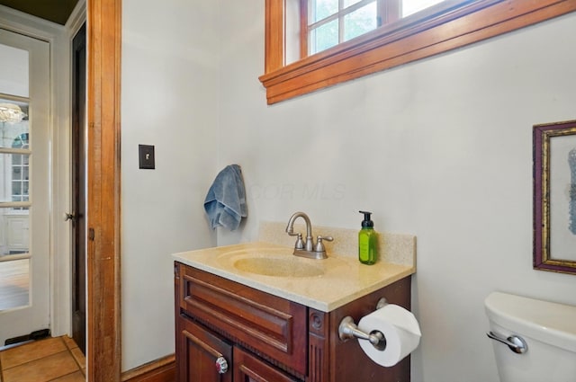 1875 King Ave, Columbus, OH 43212 - bathroom with toilet, vanity, and tile patterned floors