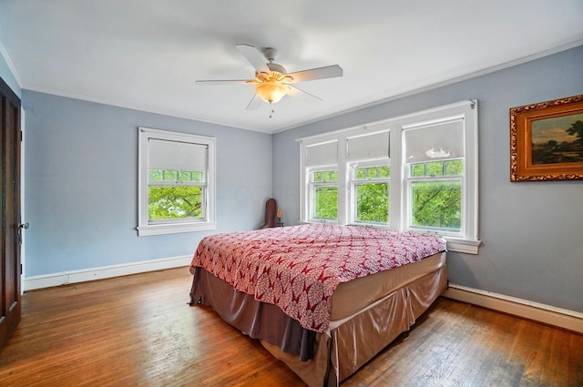 1875 King Ave, Columbus, OH 43212 - bedroom with baseboards, hardwood / wood-style flooring, ceiling fan, and ornamental molding