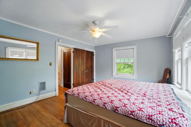 1875 King Ave, Columbus, OH 43212 - bedroom featuring baseboards, wood finished floors, ornamental molding, and a ceiling fan