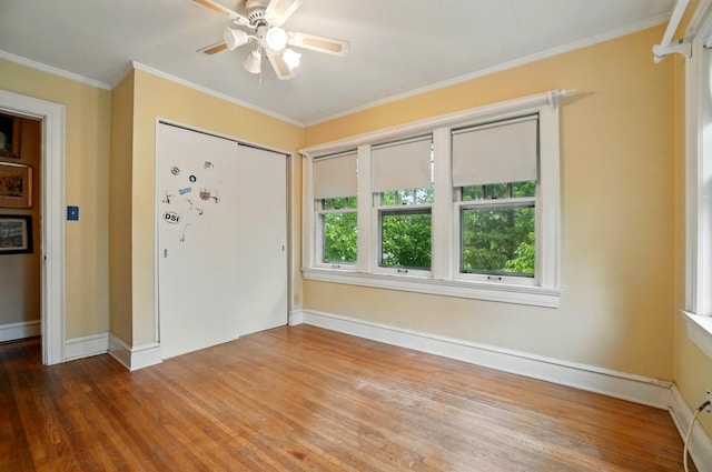 1875 King Ave, Columbus, OH 43212 - entrance foyer with wood finished floors, ornamental molding, a ceiling fan, and baseboards