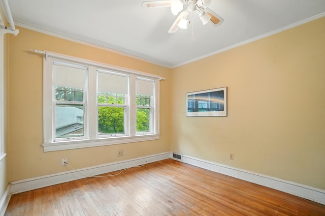 1875 King Ave, Columbus, OH 43212 - spare room featuring wood finished floors, crown molding, baseboards, and a ceiling fan