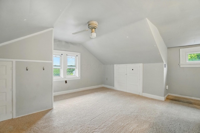 1875 King Ave, Columbus, OH 43212 - additional living space with ceiling fan, light colored carpet, lofted ceiling, and baseboards