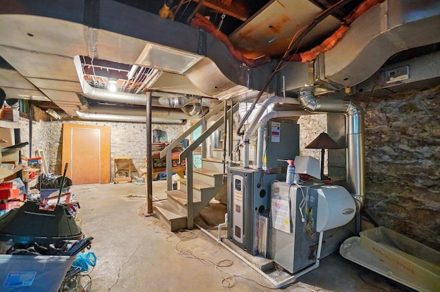 1875 King Ave, Columbus, OH 43212 - unfinished basement featuring stairs and heating unit
