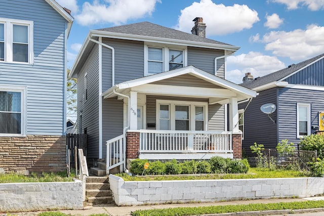 638 Stewart Ave, Columbus, OH 43206 - traditional style home with a porch and a chimney