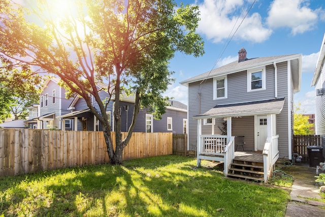 638 Stewart Ave, Columbus, OH 43206 - view of front facade with a chimney, a wooden deck, and roof with shingles