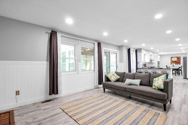 232 Camrose Ct, Columbus, OH 43230 - living area with light wood-type flooring, a wainscoted wall, recessed lighting, and a decorative wall