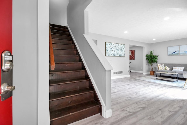 232 Camrose Ct, Columbus, OH 43230 - staircase with wood finished floors, recessed lighting, and baseboards