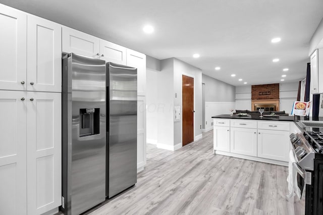 232 Camrose Ct, Columbus, OH 43230 - kitchen featuring stainless steel appliances, white cabinets, dark countertops, baseboards, and recessed lighting