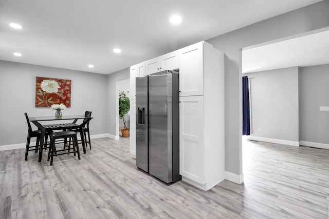 232 Camrose Ct, Columbus, OH 43230 - kitchen with stainless steel refrigerator with ice dispenser, recessed lighting, light wood-style flooring, white cabinetry, and baseboards