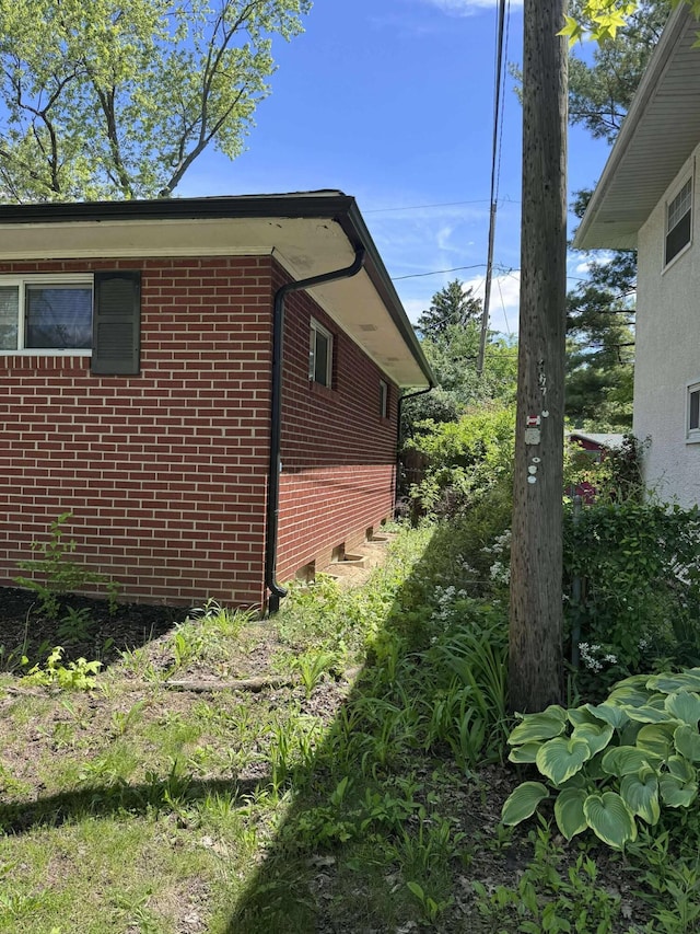 1385 Gumwood Dr, Columbus, OH 43229 - view of side of home with brick siding