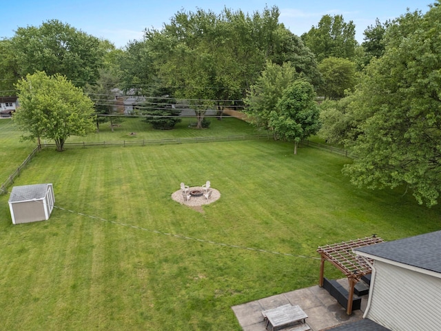 13682 Cobblestone Ln, Pickerington, OH 43147 - view of yard featuring a fire pit and an outdoor structure