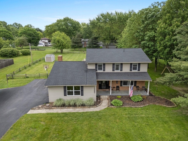 13682 Cobblestone Ln, Pickerington, OH 43147 - view of front of property with a porch, roof with shingles, and asphalt driveway