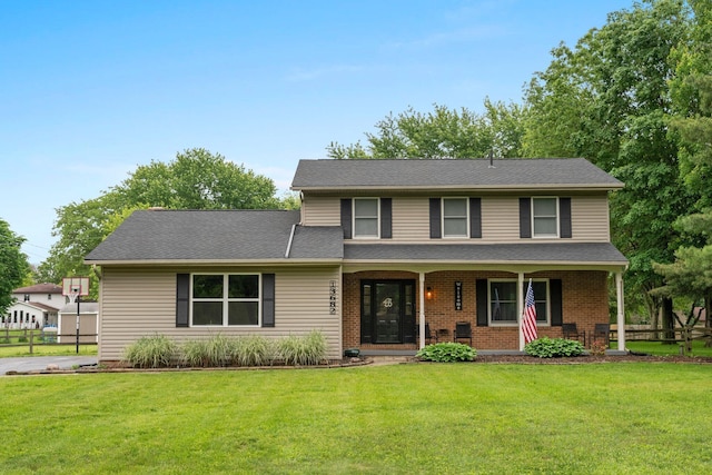 13682 Cobblestone Ln, Pickerington, OH 43147 - traditional home featuring a porch and brick siding